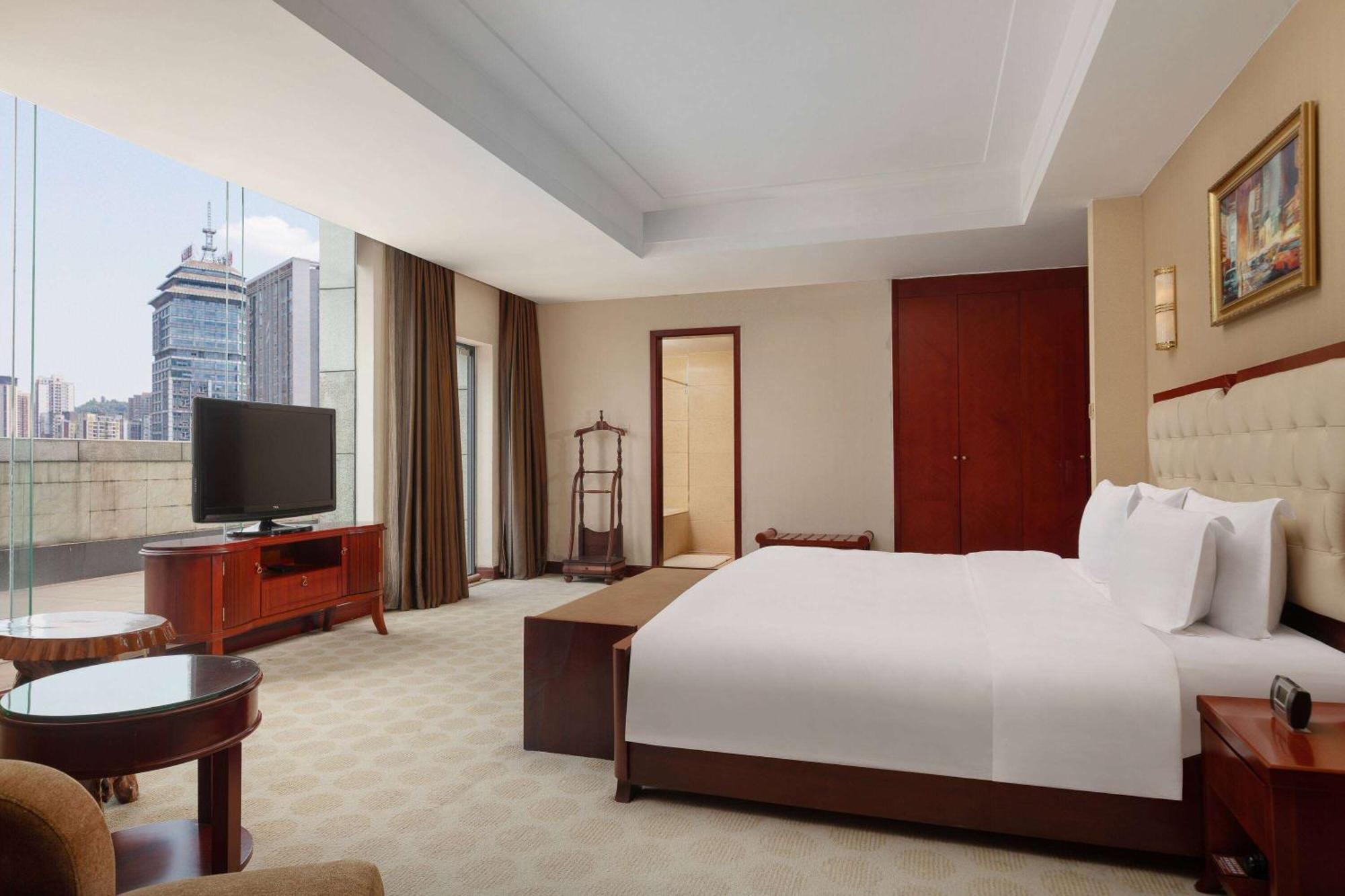 Hotel Ramada Plaza By Wyndham Chongqing West Extérieur photo