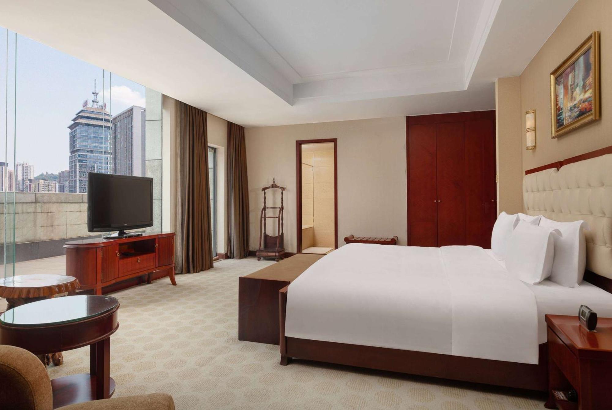 Hotel Ramada Plaza By Wyndham Chongqing West Extérieur photo