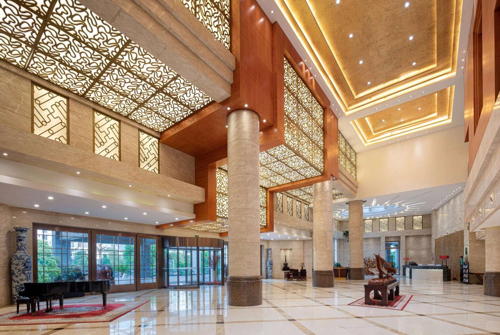 Hotel Ramada Plaza By Wyndham Chongqing West Extérieur photo