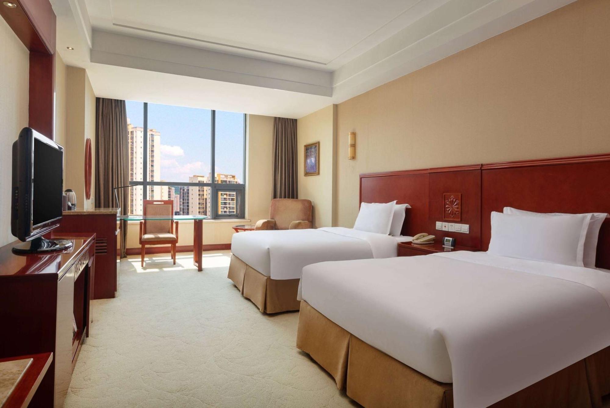 Hotel Ramada Plaza By Wyndham Chongqing West Extérieur photo
