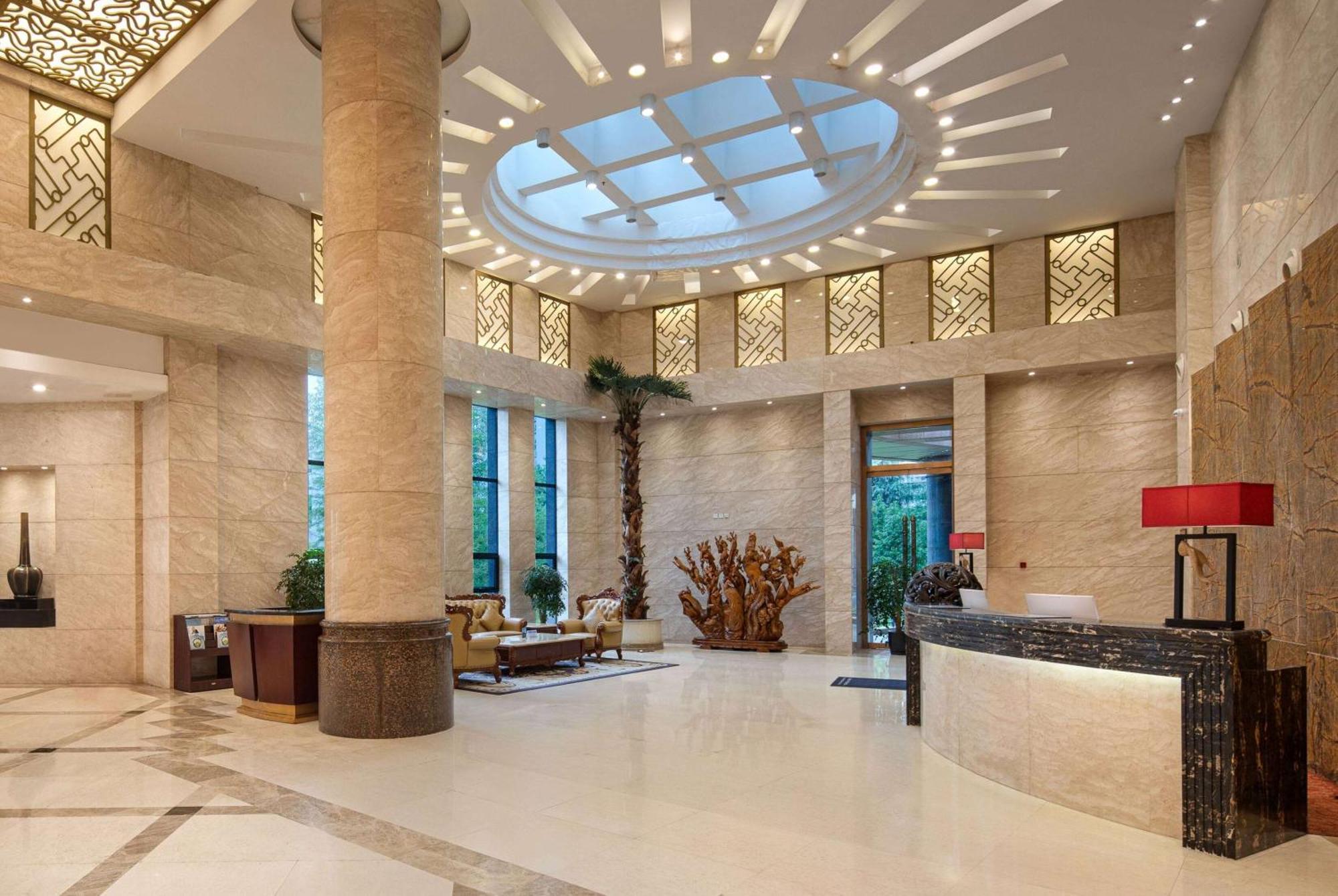 Hotel Ramada Plaza By Wyndham Chongqing West Extérieur photo